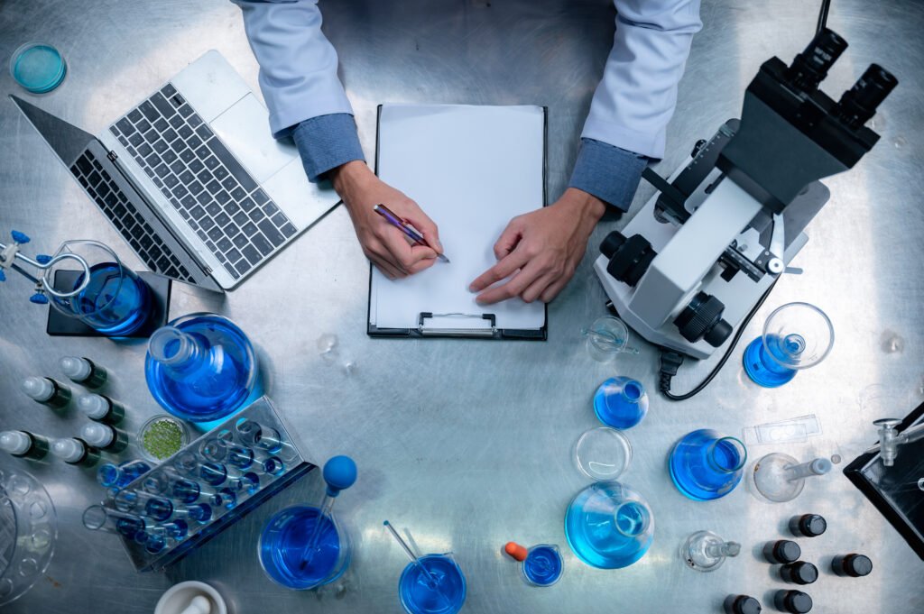 researcher team and the development of antiretroviral drugs in a chemical laboratory